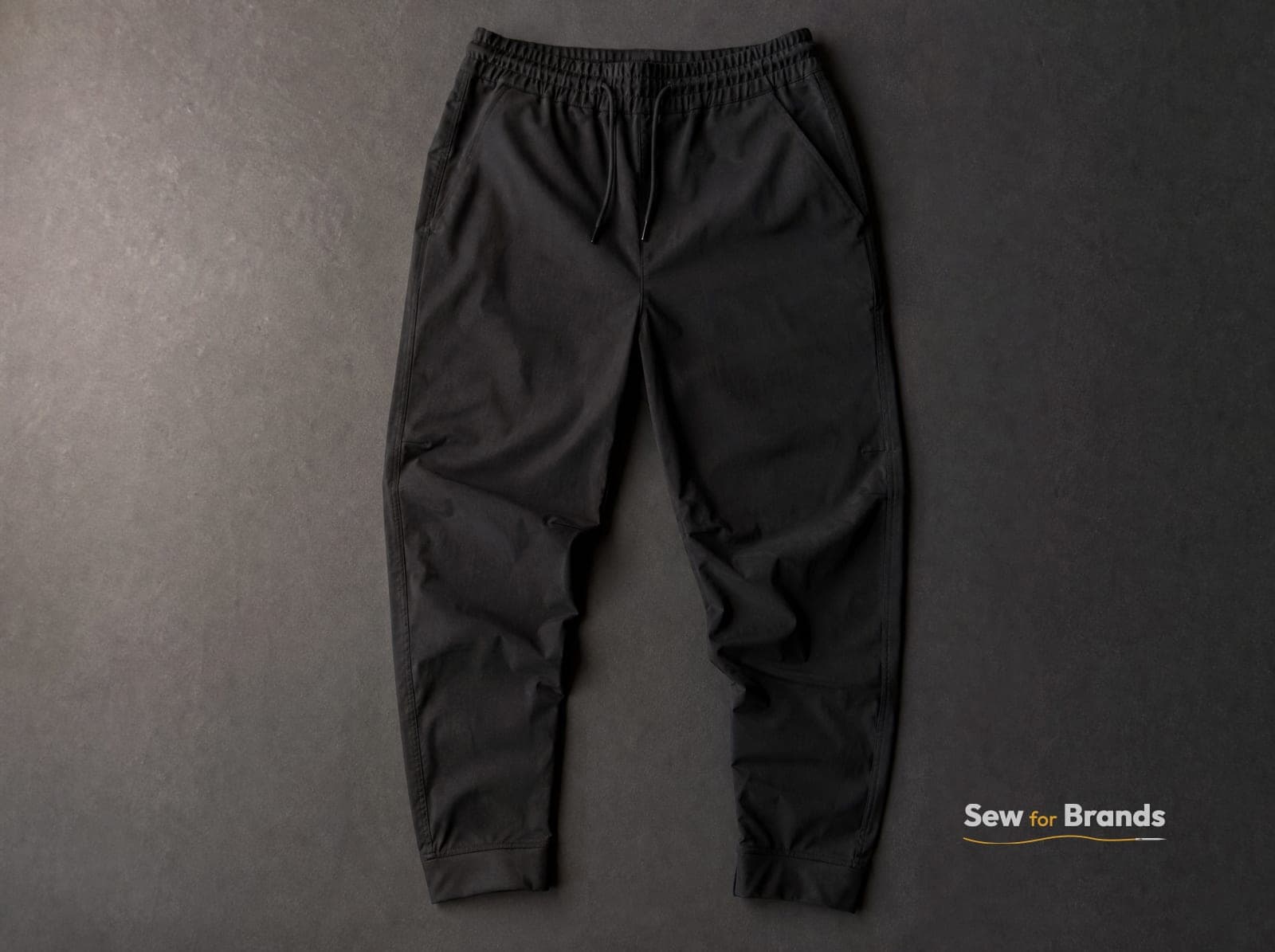 Black tapered training joggers, front view